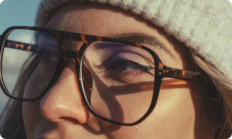 close up of woman wearing glasses